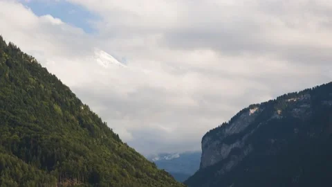 4K Timelapse of Moving Clouds Across Mountain Ranges in Interlaken, Switzerland 스톡 동영상 135093669