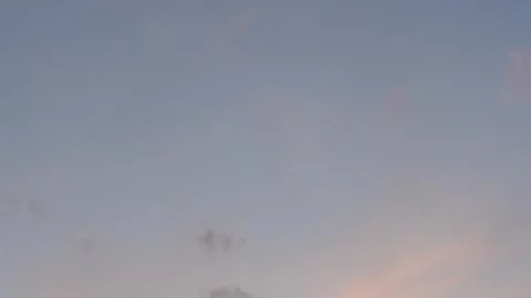 4K Timelapse of Moving clouds at Sunset. Time lapse of clouds lit by the setting Stock Footage 281646002