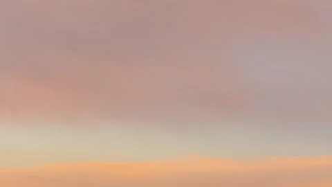 4K Timelapse of Moving clouds at Sunset. Time lapse of clouds lit by the setting Stock Footage 303696773
