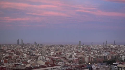4K Timelapse nightfall Barcelona skyline night light and crowded city center day Stock Footage