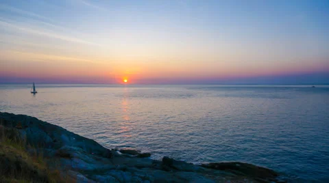 4K. Timelapse of ocean during beautiful sunset - ULTRA HD, 4096x2304. Stock Footage 36722131