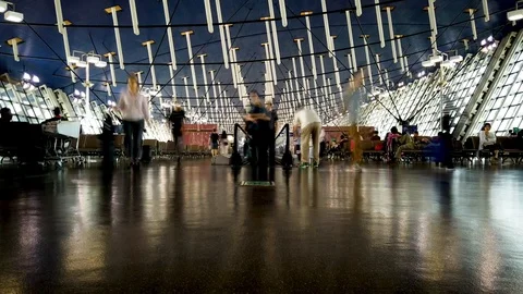 4K Timelapse of people leaving a travelator in an airport Stock Footage