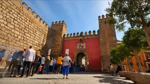 4K Timelapse of people waiting to enter the Royal Alcázar in Seville City Center Stock Footage 125724602