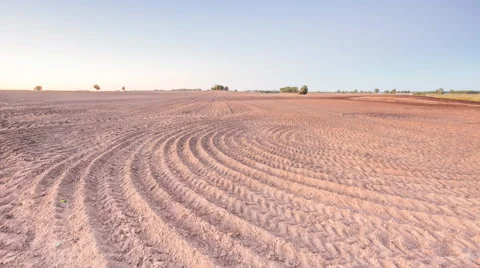 4k timelapse of plowed field at evening Stock Footage 58953115