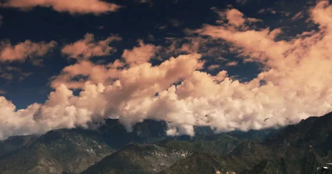 4k timelapse puffy clouds mass rolling over Tibet mountaintop,roof of the World Stock Footage 44827495