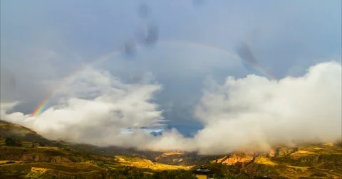 4K Timelapse of Rainbow and Clouds near Mount Illimani Bolivia South America Stock Footage 78208423