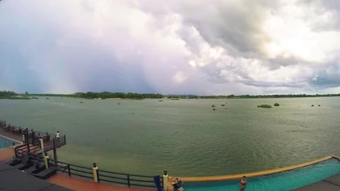 4k timelapse rainbow appear after rain infront of swimming pool or background Stock Footage 119317337