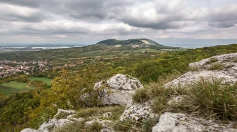 4K timelapse with rock and cloudy sky Stock Footage 67582562
