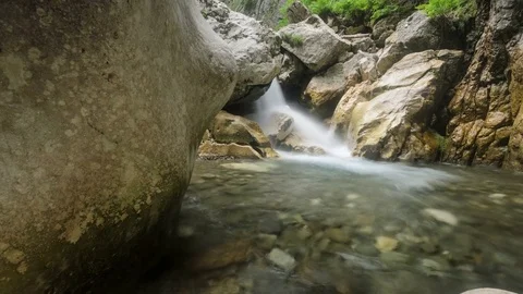 4k timelapse of a rushing mountain river in Buila Mountains, Romania. Stock Footage 77139755