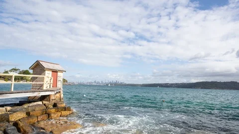 4K Timelapse of a small house looking out to the harbour Stock Footage 90637996