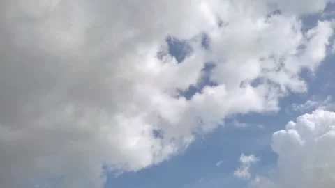 4K timelapse of soft white cumulus clouds moving on the blue sky background Stock Footage 308068060