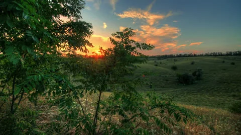 4k. Timelapse Spring Sunset Over Meadow Stock Footage 25887551