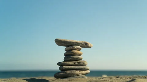 4K Timelapse stop motion of stacking rocks Stock Footage 292640008