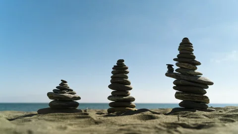 4k Timelapse stop motion of stacking rocks Stock Footage 292640061