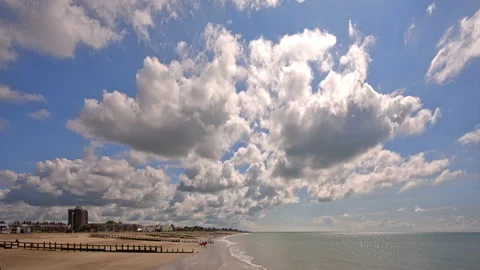 4K timelapse of Stratocumulus clouds over Littlehampton beach, cloudy, UK Stock Footage