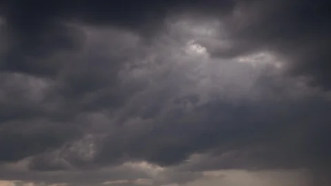 4K timelapse with sun beams shining through dramatic and fast moving low clouds 库存影片 96066948