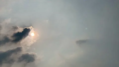 4K Timelapse Sun Covered by Dark Clouds Then Reappearing Jakarta Stock Footage 341583827