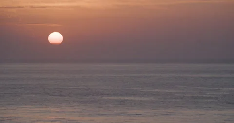 4K timelapse of sun getting down above Atlantic ocean on Portuguese coast Stock Footage 163084723