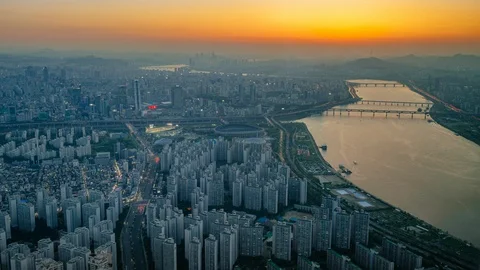 4k timelapse of sun setting in Seoul, South Korea, from the highest point - Stock Footage 100571726