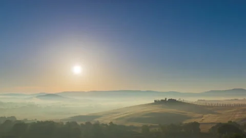 4K Timelapse Sunrise over the rolling hills in Tuscany countryside , Italy Stock Footage 141498475
