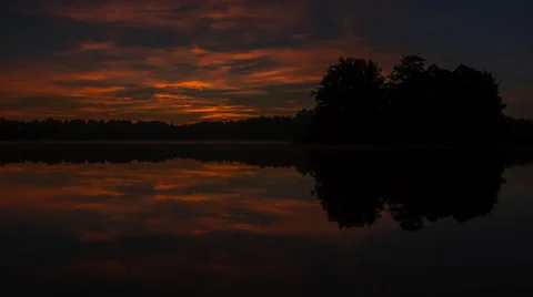 4k timelapse of before sunrise sky over lake Stock Footage 58744357