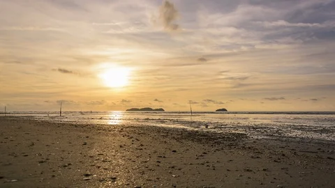 4k timelapse of sunset at a beach Stock Footage 125655915