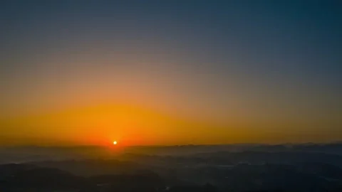 4K Timelapse of Sunset Glow and Sky Light Changes over Meili Snow Mountain Stock Footage 338003293