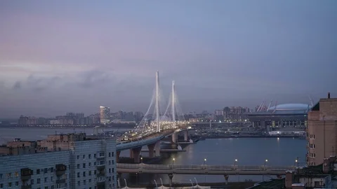 4K timelapse of sunset over cable-stayed bridge in St Petersburg, Russia Stock-Footage 83827066