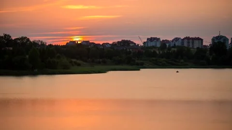 4k Timelapse of sunset over lake and city in Mazury lake district Stock Footage 58697230