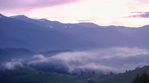 4K timelapse of sunset over mountain panorama landscape view with fog Stock Footage 111374570