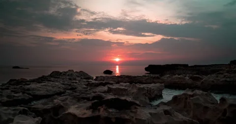 4K Timelapse - Sunset Over the Sea at Dwejra, Malta Stock Footage 134809016