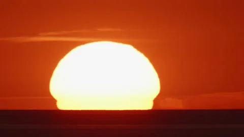 4K - Timelapse of a sunset at sea. Close-up Stock Footage 218614994