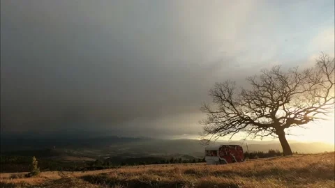 4k timelapse of a sunset storm coming in the countryside of an Italian village Stock Footage 165401770