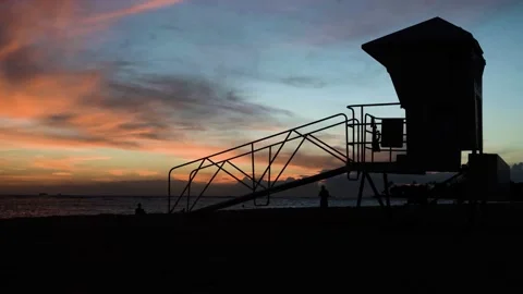 4K Timelapse of the sunsetting on a beach Stock Footage 147998397