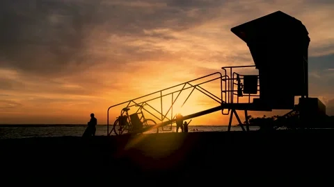 4K Timelapse of the sunsetting on a beach Stock Footage 147998426