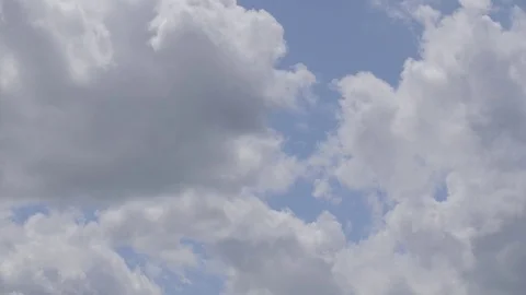 4k timelapse of thick white clouds in front of blue sky (2) Video stock 75159306