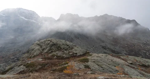 4K timelapse of top of the mountain, moving clouds on peak, natural landscape Stock Footage 220020708
