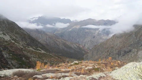 4K timelapse from top of the mountain, moving clouds, valley view Stock Footage 220020787