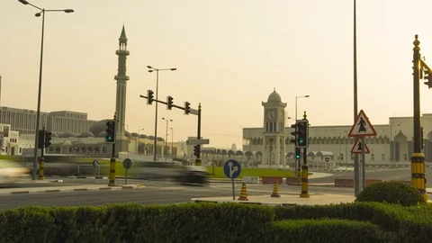 4K timelapse of traffic with clock tower in background, Doha, Qatar Stock Footage 111758856