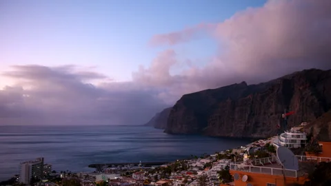 4K Timelapse of Twilight Clouds Over Los Gigantes Cliffs, Tenerife Stock Footage 323075911