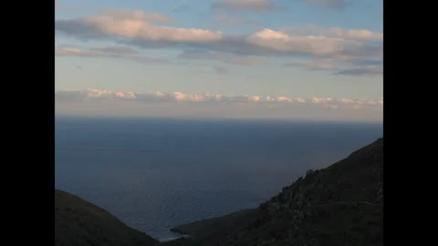 4K timelapse of two cargo ships passing in opposite directions at golden hour, Stock Footage 329180539