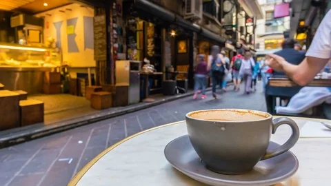 4k timelapse video of enjoying coffee in a laneway cafe in Melbourne Stock Footage