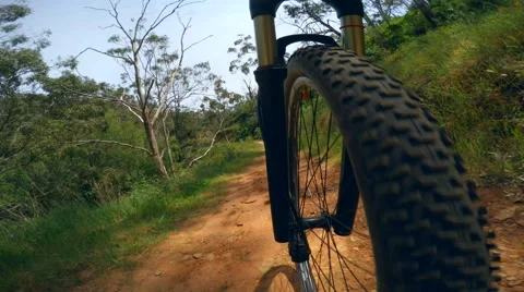 4k timelapse video of mountain biking on a dirt road Stock Footage 43506331