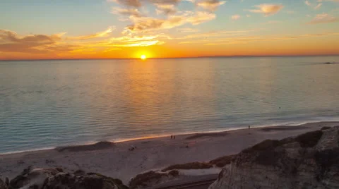 4K Timelapse video of the sunset over a beach Stock Footage 58564539