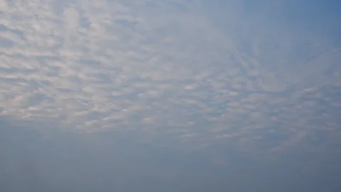 4k Timelapse of white clouds with blue sky, Time lapse Moving clouds in horizon Stock Footage 102492693