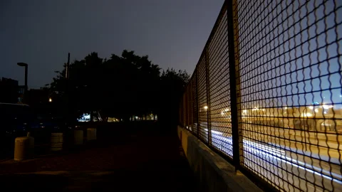 4K TIMELAPSE OF WINDY TREES NEXT TO BUSY HIGHWAY Stock Footage 131277831