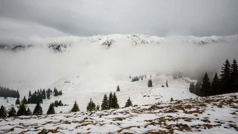 4k timelapse of a windy winter day in Piatra Craiului Mountains. Stock Footage 79554577