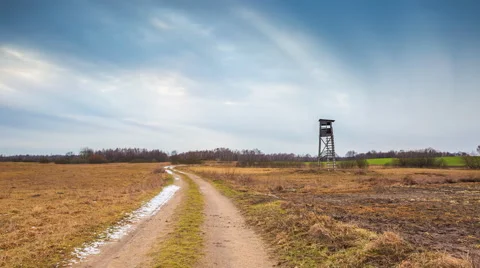 4k timelapse of winter or spring field with sandy road. Stock Footage 60225461