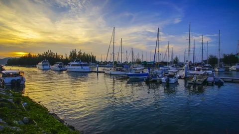 4K Timelapse of a yatch at the dock during sunset. Stock Footage 115059745