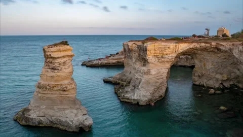4k, Timelapses of rocky arch seaside torre sant'andrea, lecce, puglia, italy Stock Footage 222010101